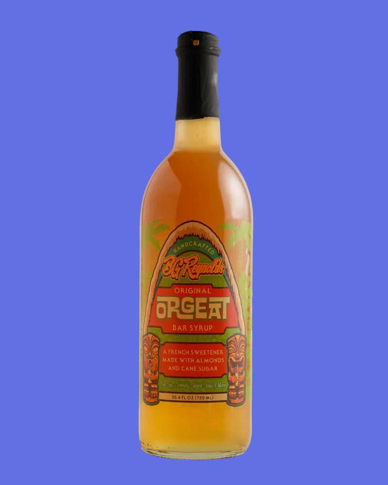 A bottle of Big Republics Original Orgeat Bar Syrup filled with golden syrup, featuring a colorful label with tiki masks and a black screw cap, set against a plain light gray background.
