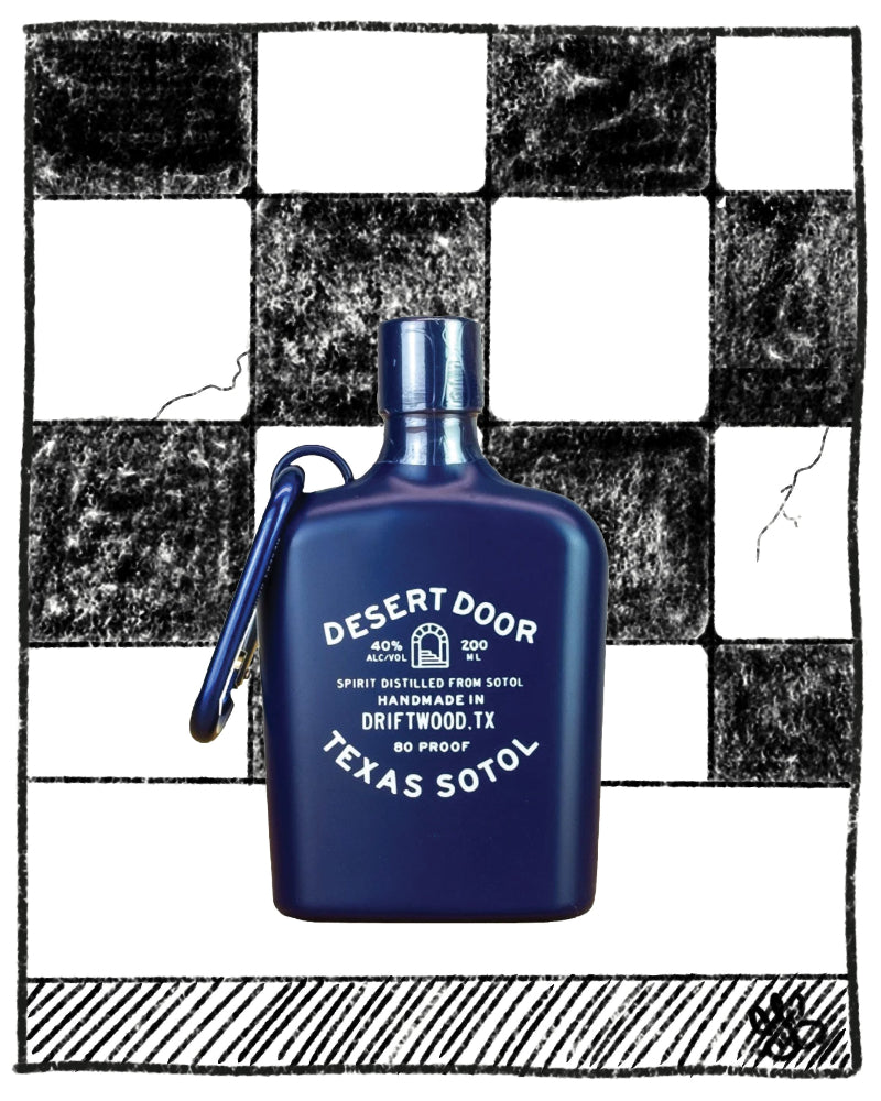 Blue bottle of Desert Door Texas Sotol on a black and white checkered background