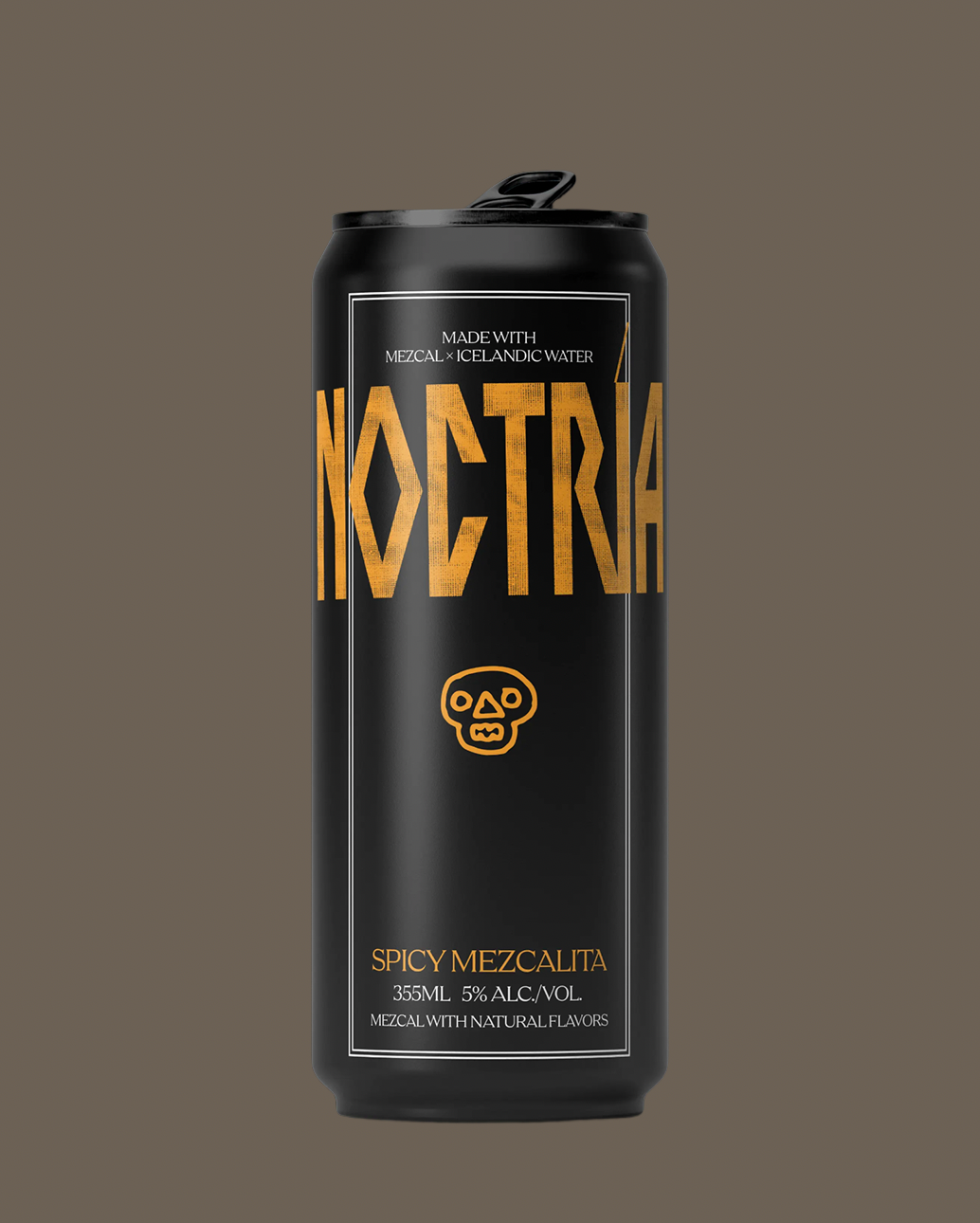 A black aluminum can of Noctria Spicy Mezcalita 3% alcohol-free beverage, featuring gold lettering and a skull logo, centered against a solid dark brown background.