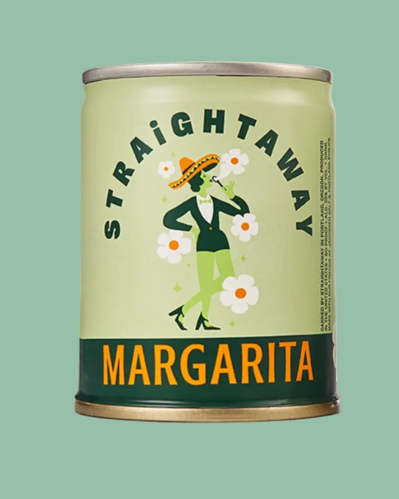 A cylindrical can of Straightaway Margarita beverage on a pale yellow background. The can has a light sage green label with a dark green band at the bottom, orange text reading 'MARGARITA', and an illustration of a woman in a sombrero surrounded by white flowers.