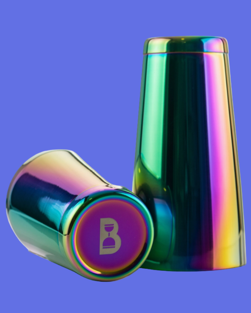 Multicolored metallic tumbler with a visible brand logo on a blue background