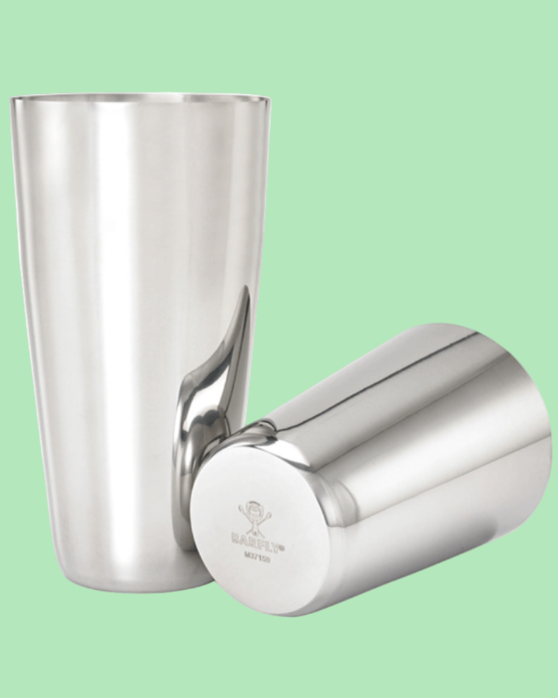 Two silver metal tumblers on a white background
