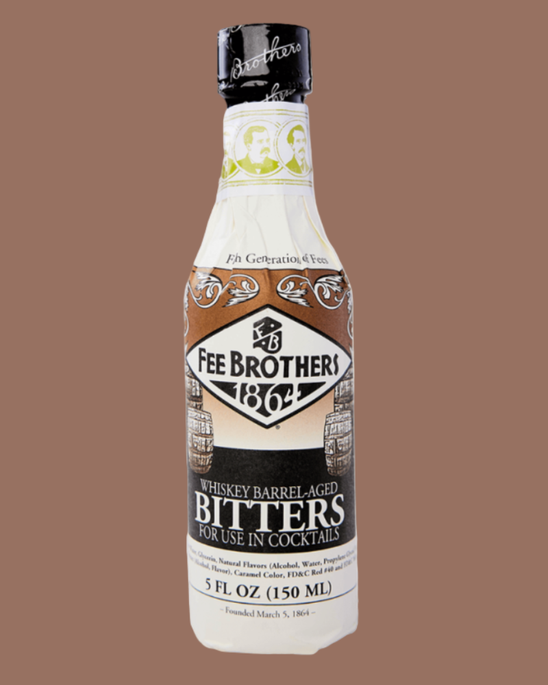 Bottle of Fee Brothers Whiskey Barrel Aged Bitters on a brown background