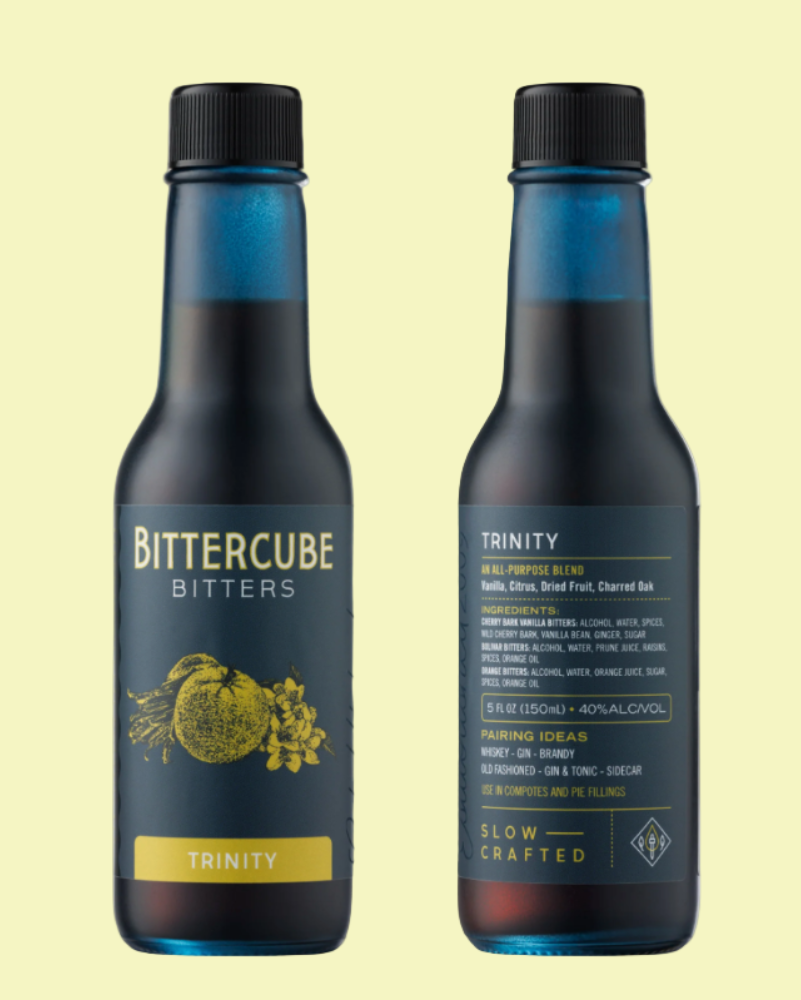 Two bottles of Bittercube bitters on a light yellow background
