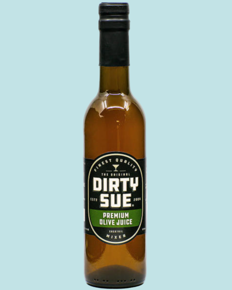 Bottle of Dirty Sue olive juice on a light blue background