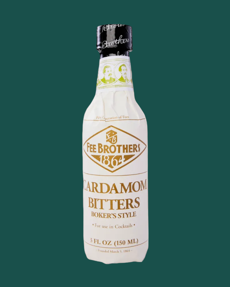 Bottle of Fee Brothers Cardamom Bitters on a brown background