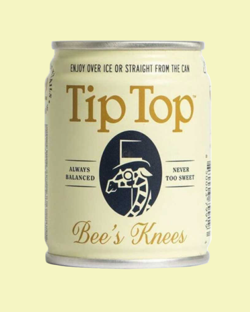 Can of Tip Top Bee's Knees on a light yellow background
