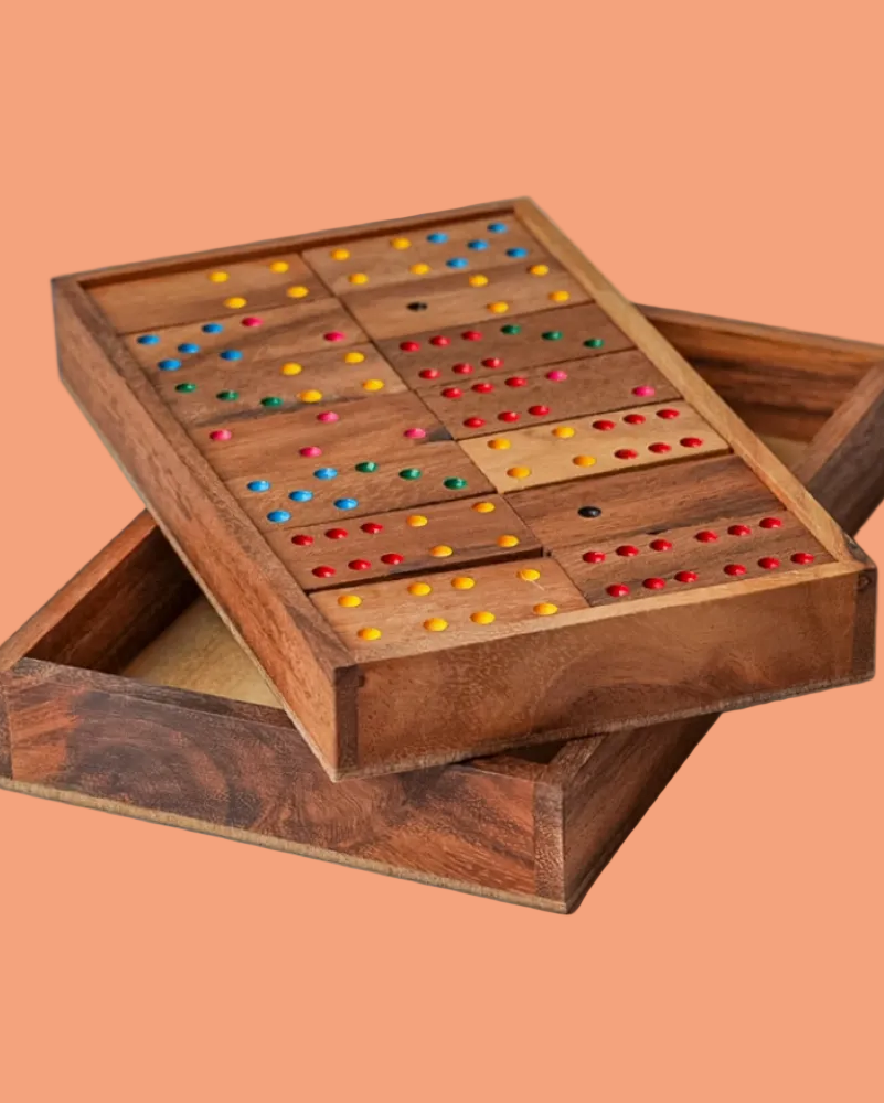 Wooden board game with colorful pieces on a peach background
