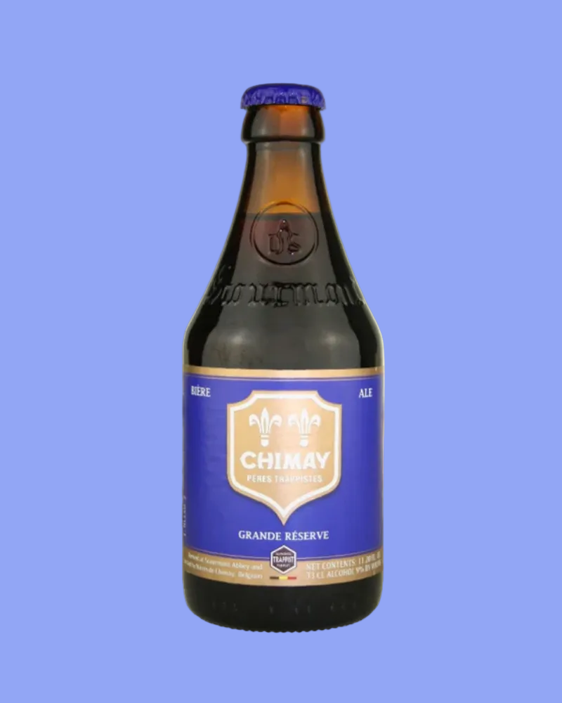 Chimay beer bottle with blue label on a white background