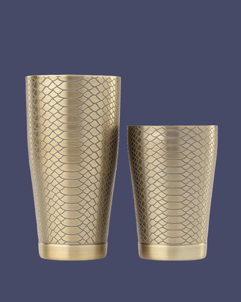 Two metallic gold vases with textured patterns on a white background