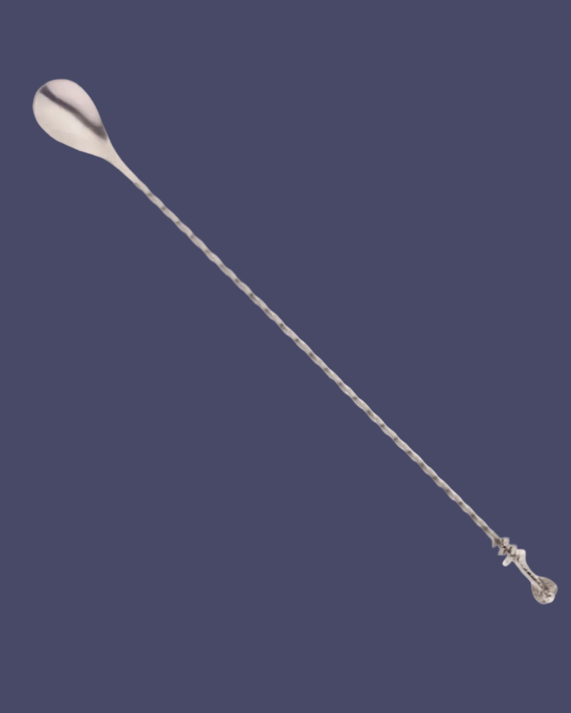 Silver basting spoon on a white background