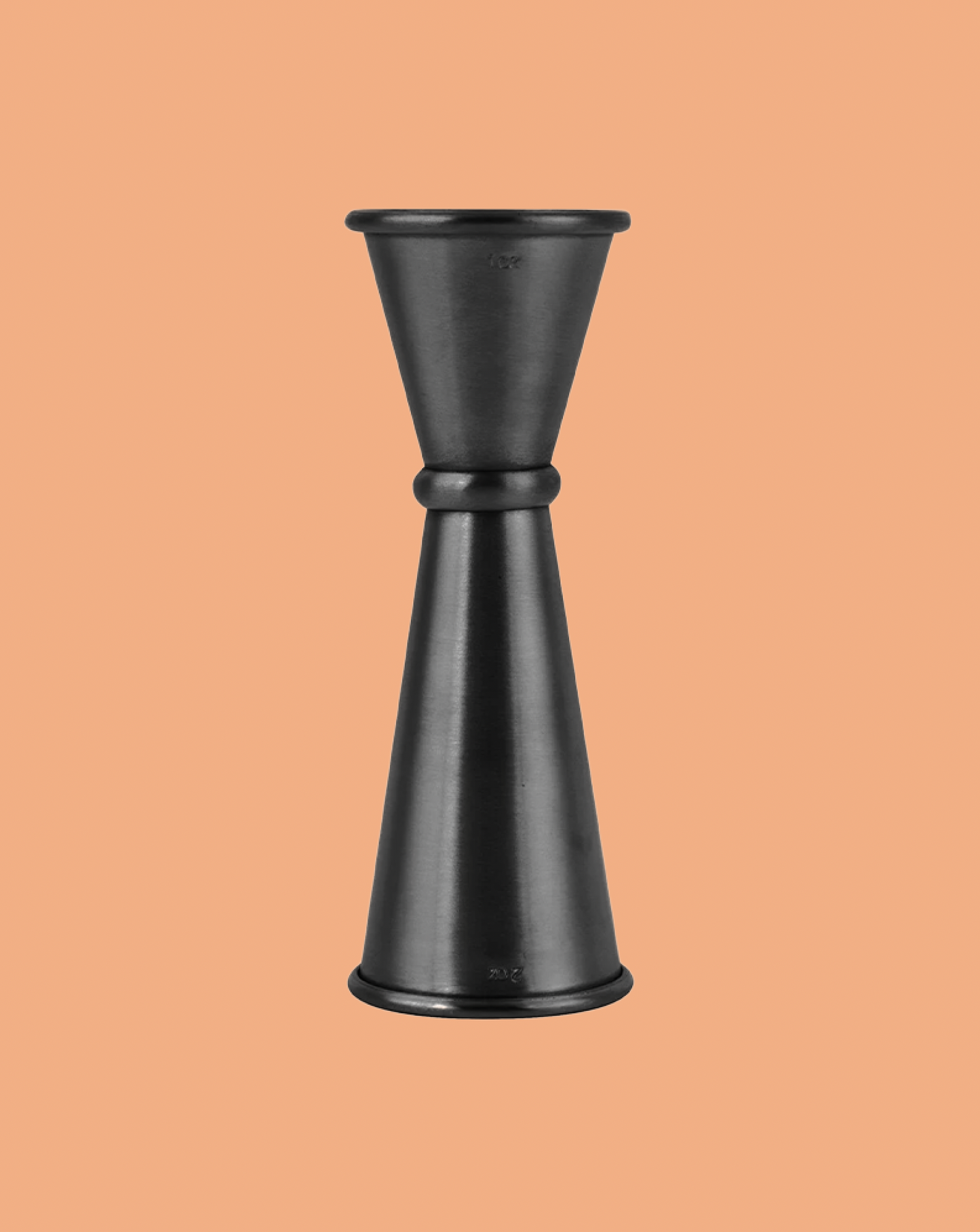 Black metal jigger on a beige background