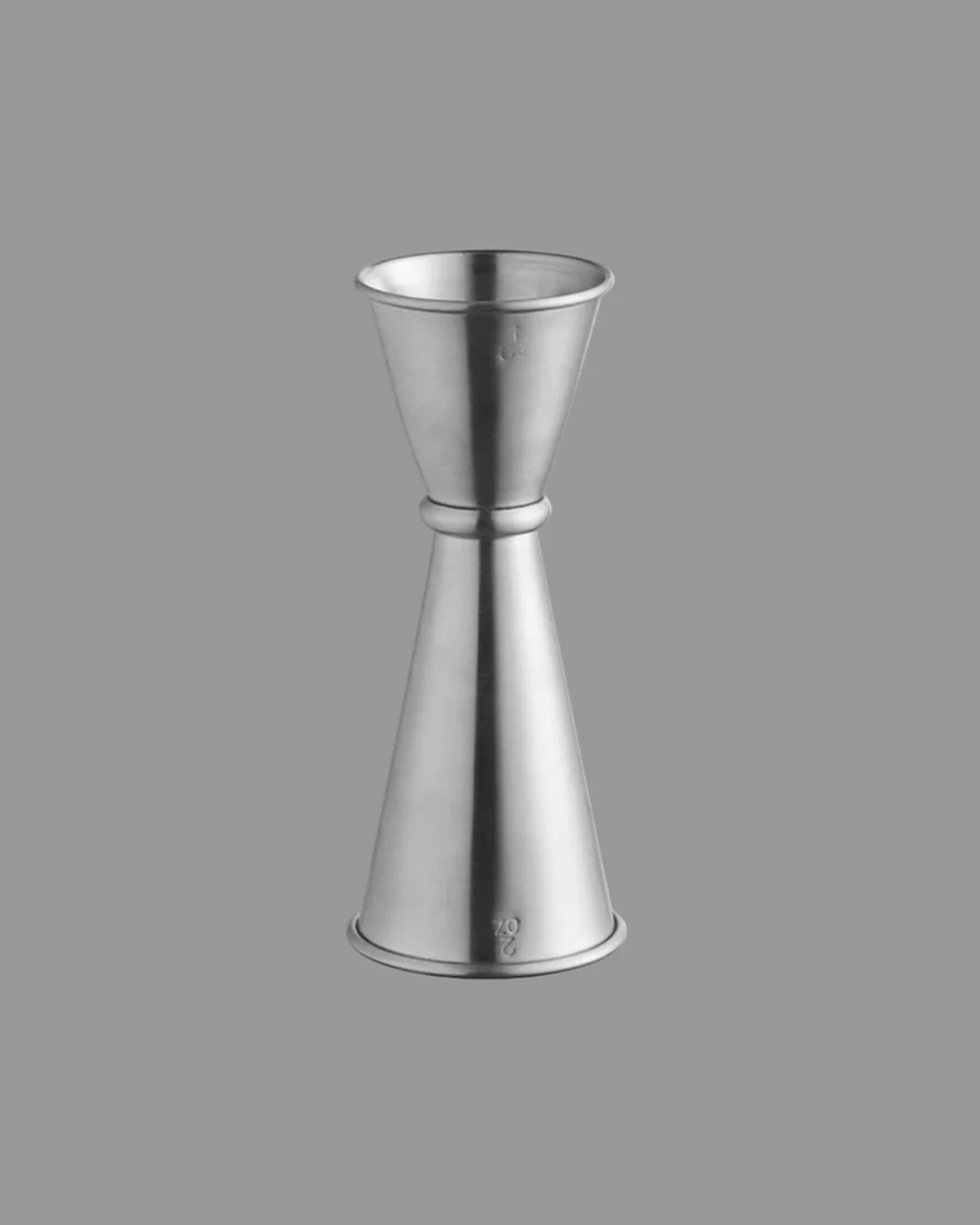 Metallic cocktail shaker on a gray background