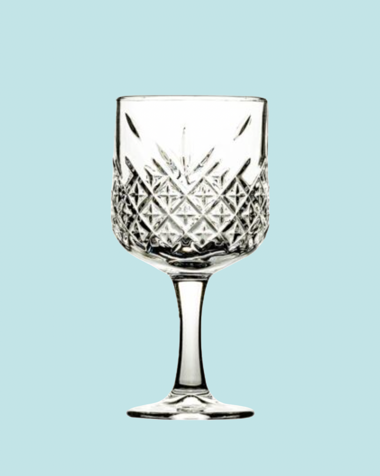 Clear glass with diamond cut pattern on a light blue background