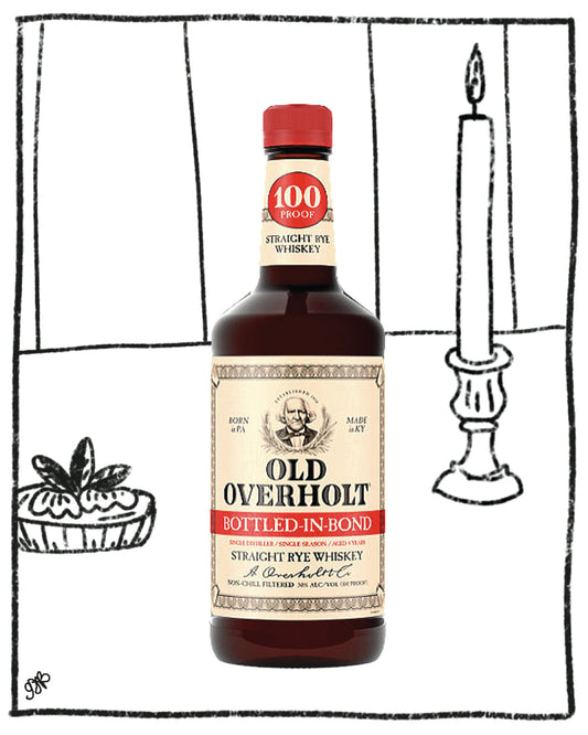 Old Overholt Bottled-in-Bond whiskey bottle with a candle and plant in the background