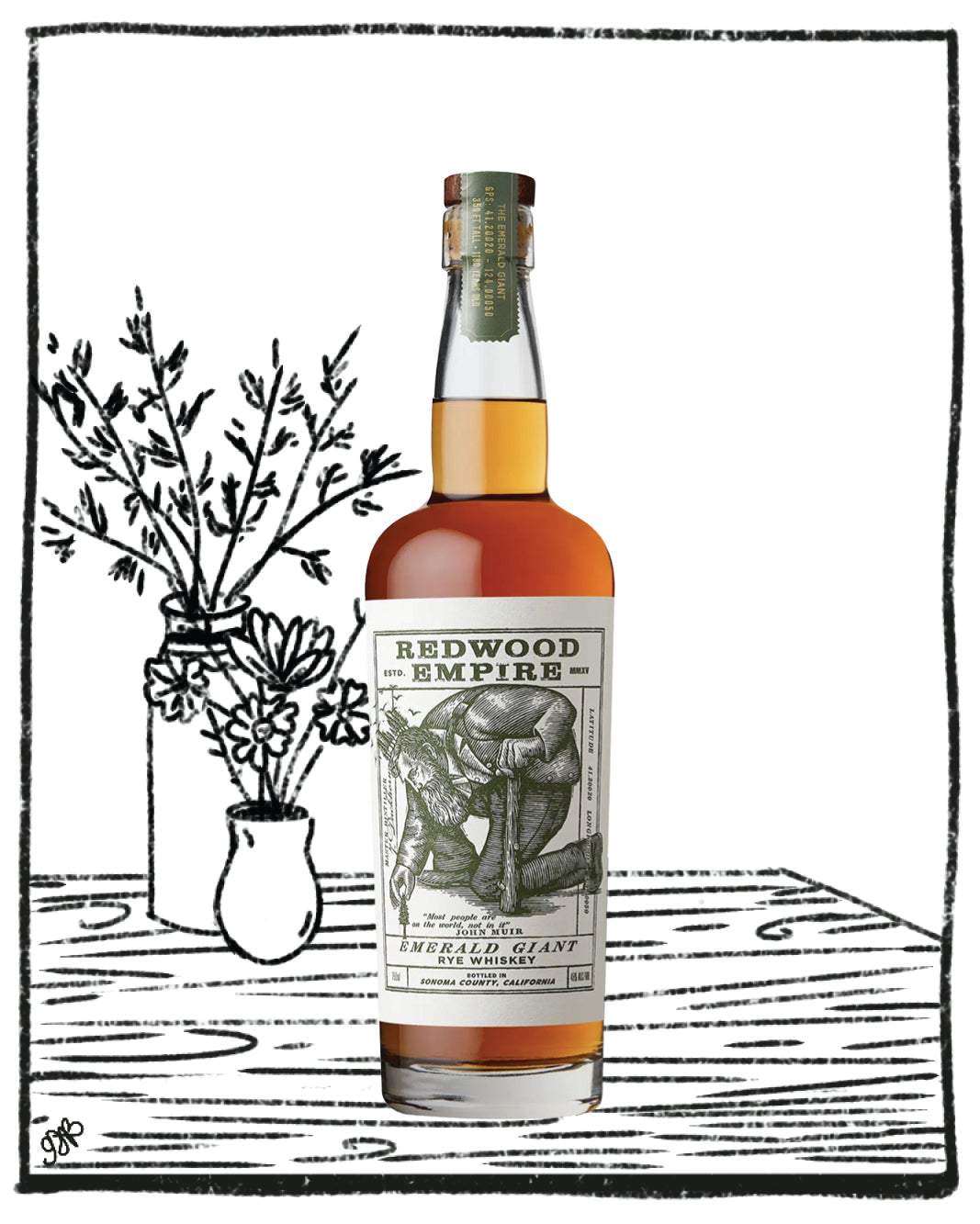 Bottle of Redwood Empire whiskey with a decorative background