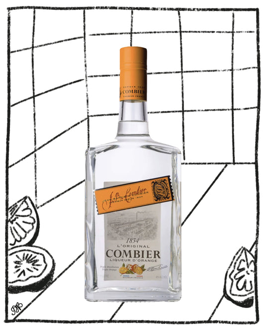 Bottle of Comber liqueur with an orange label on a black and white grid background