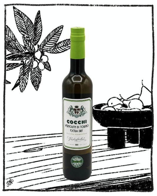 Bottle of Cocchi vinegar with a decorative background featuring an olive branch and bowl of fruits.