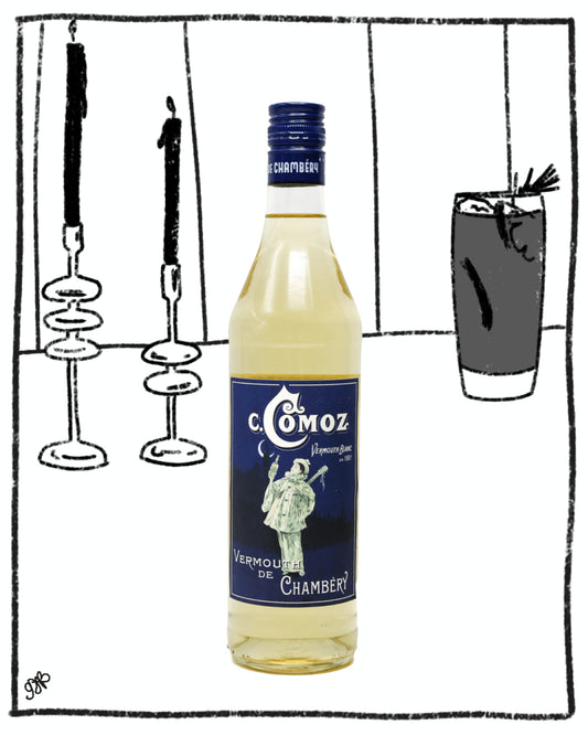 Bottle of Comoz Vermouth de Chambery with a blue label against a black and white drawing background.