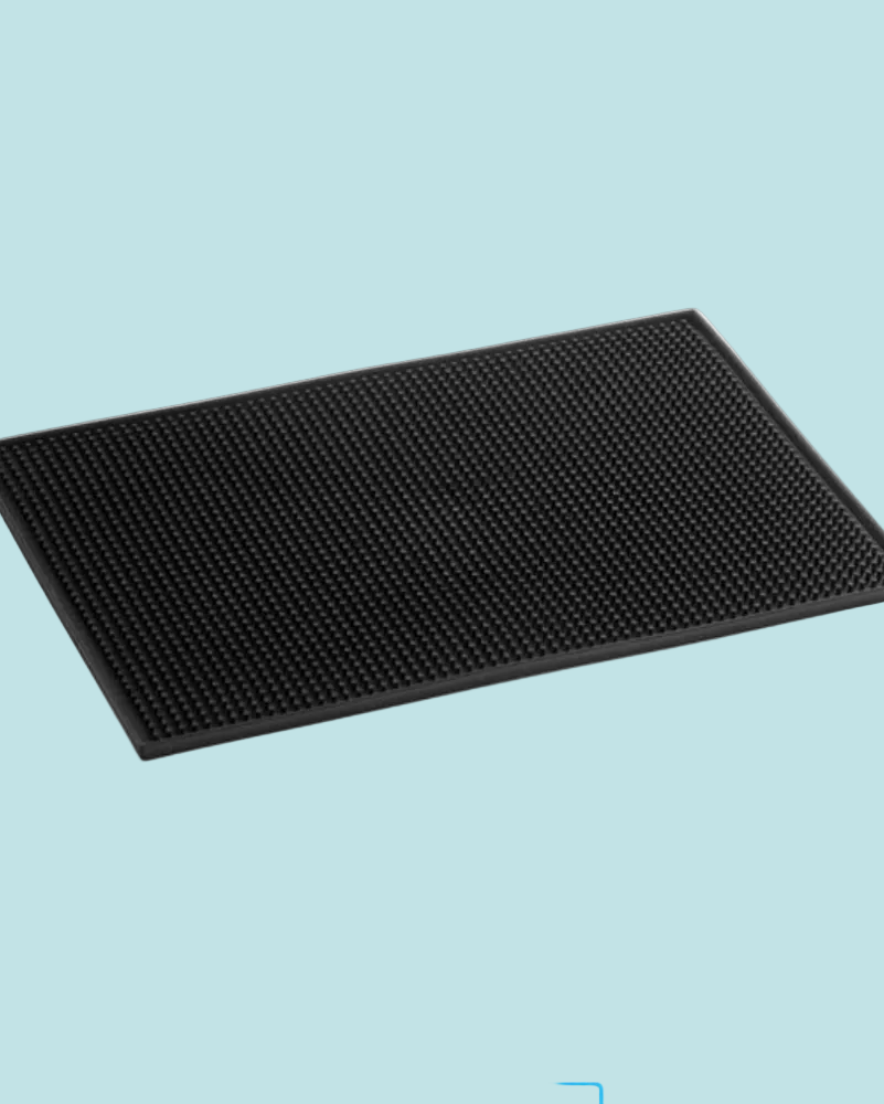 A black rectangular textured mat with a raised grid-like pattern, shown at an angle on a light blue background.