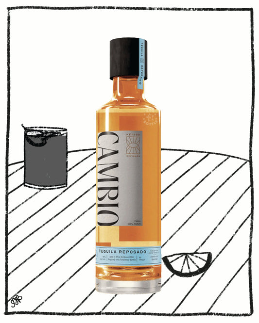 Bottle of Cambio Tequila Reposado with a glass and lime wedge on a white background