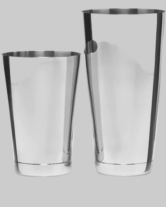 Two stainless steel cocktail shakers, one short and one tall, shown on a plain white background.