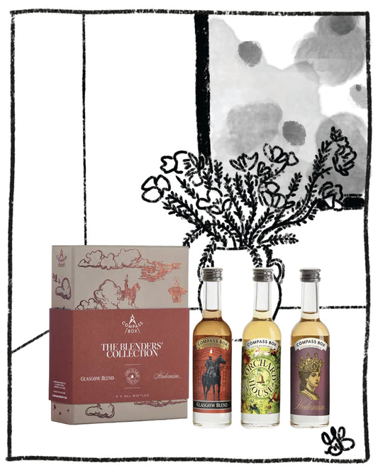 Three bottle gift box of Compass whiskey in front of a drawn background