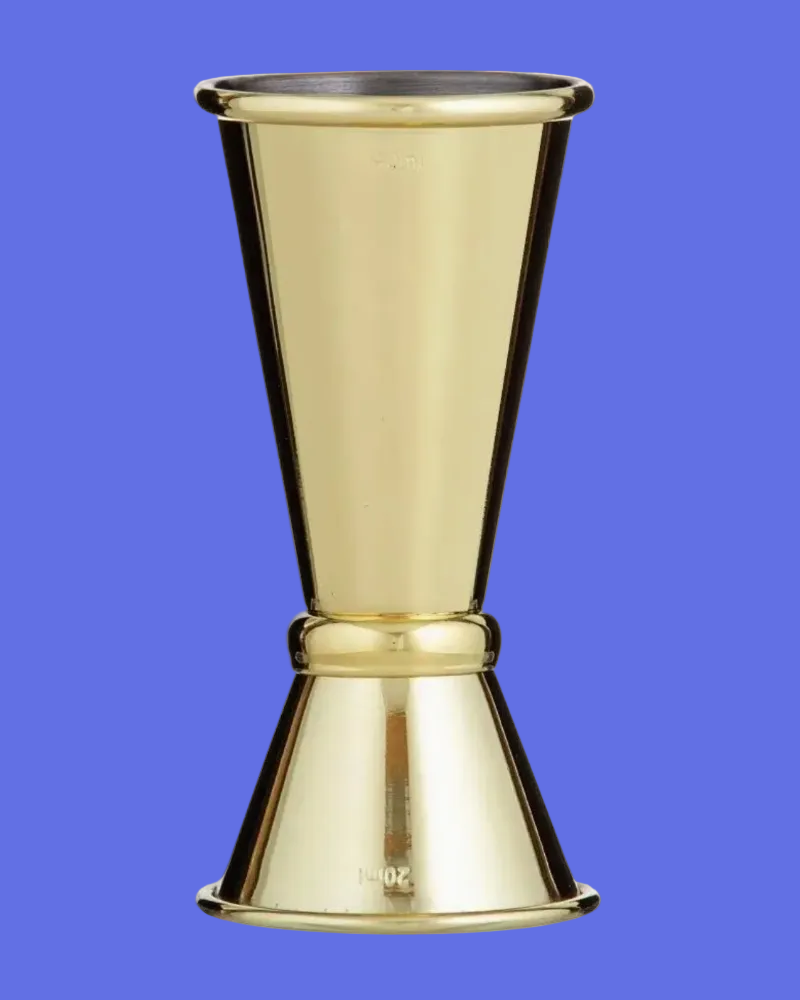 A polished brass jigger with a flared base and a conical top, featuring engraved ounce markings near the base, set against a plain white background.