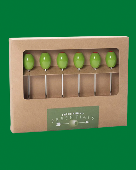 Set of green olives on toothpicks in a cardboard packaging with 'Entertaining Essentials' label.