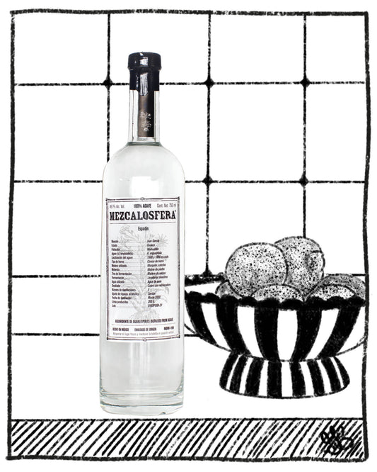 Bottle of Mezcalosfera with a bowl of eggs on a tiled background
