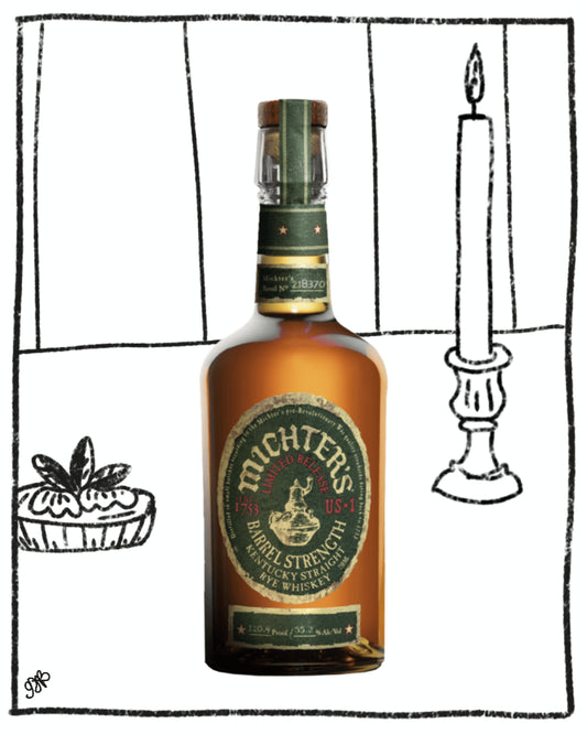 Bottle of Michter's bourbon whiskey with a candle and herbs in the background
