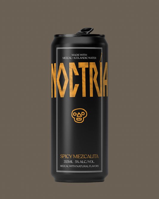 A black aluminum can of Noctria Spicy Mezcalita 3% alcohol-free beverage, featuring gold lettering and a skull logo, centered against a solid dark brown background.