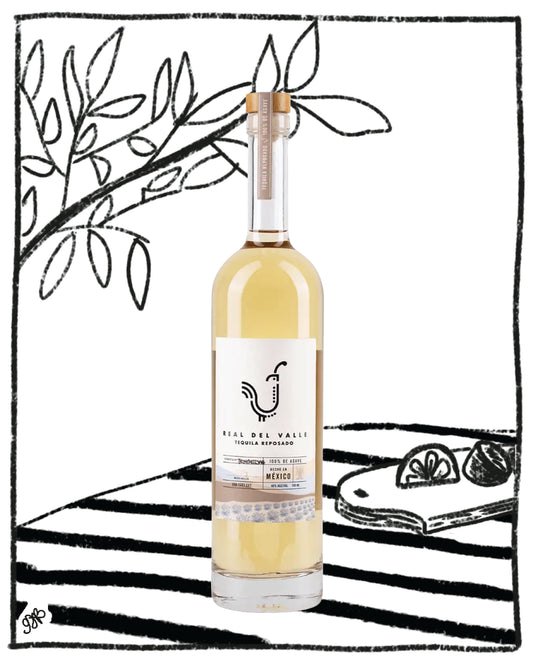Bottle of white wine with a label on a black and white striped background