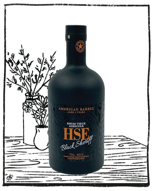 Bottle of HSF Black Sheriff rum on a wooden surface with a minimalistic background