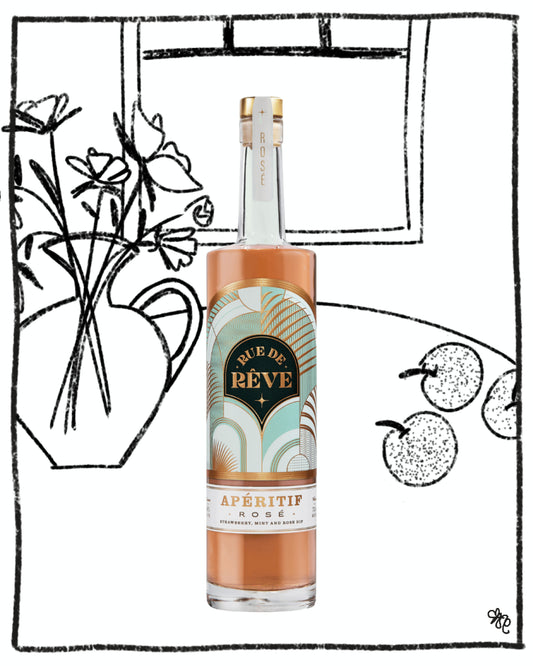 Bottle of 'RÃƒÂ¨ve de RÃƒÂ¨ve' apÃƒÂ©ritif rose with decorative elements in the background