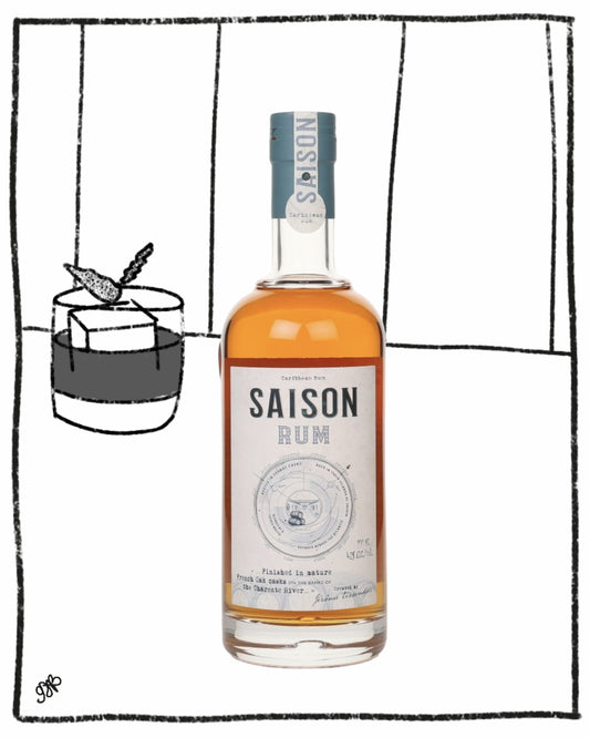 Bottle of Saison Rum with a glass of water on a white background