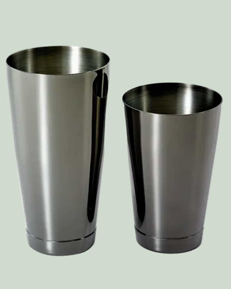 Two stainless steel tumblers on a light gray background