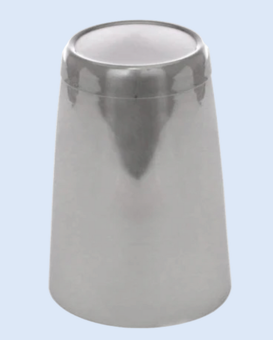 Metallic cylindrical object on a light blue background