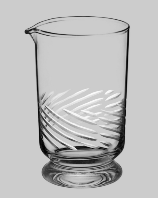 Clear glass with leaf pattern on a gray background