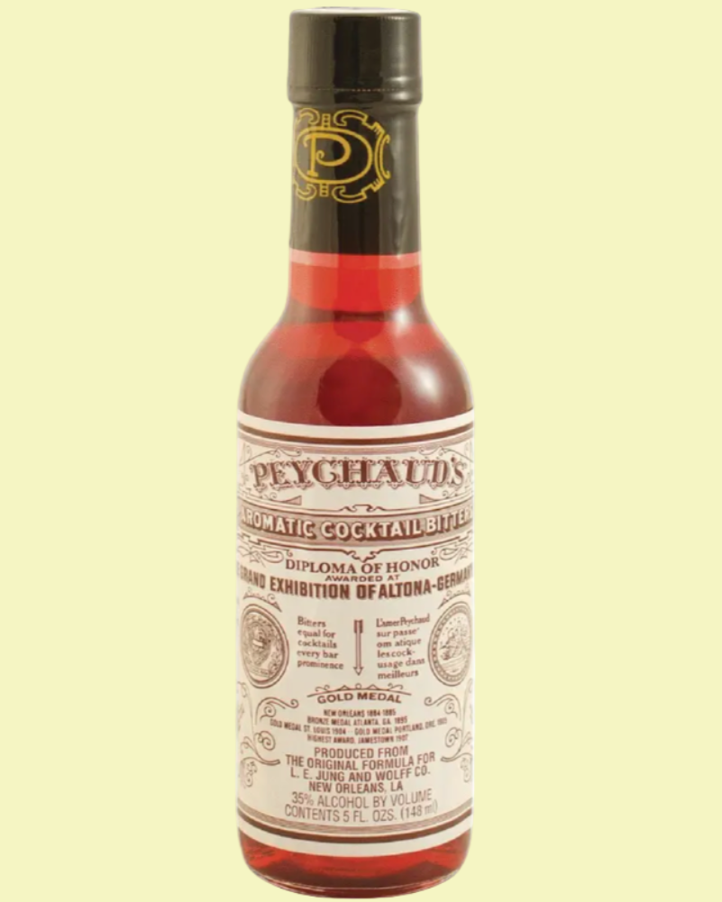 Bottle of Peychaud's Bitters on a beige background