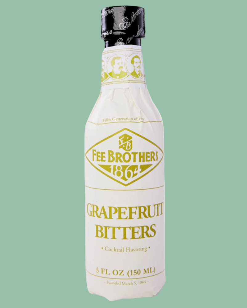 Bottle of Fee Brothers Grapefruit Bitters on a green background