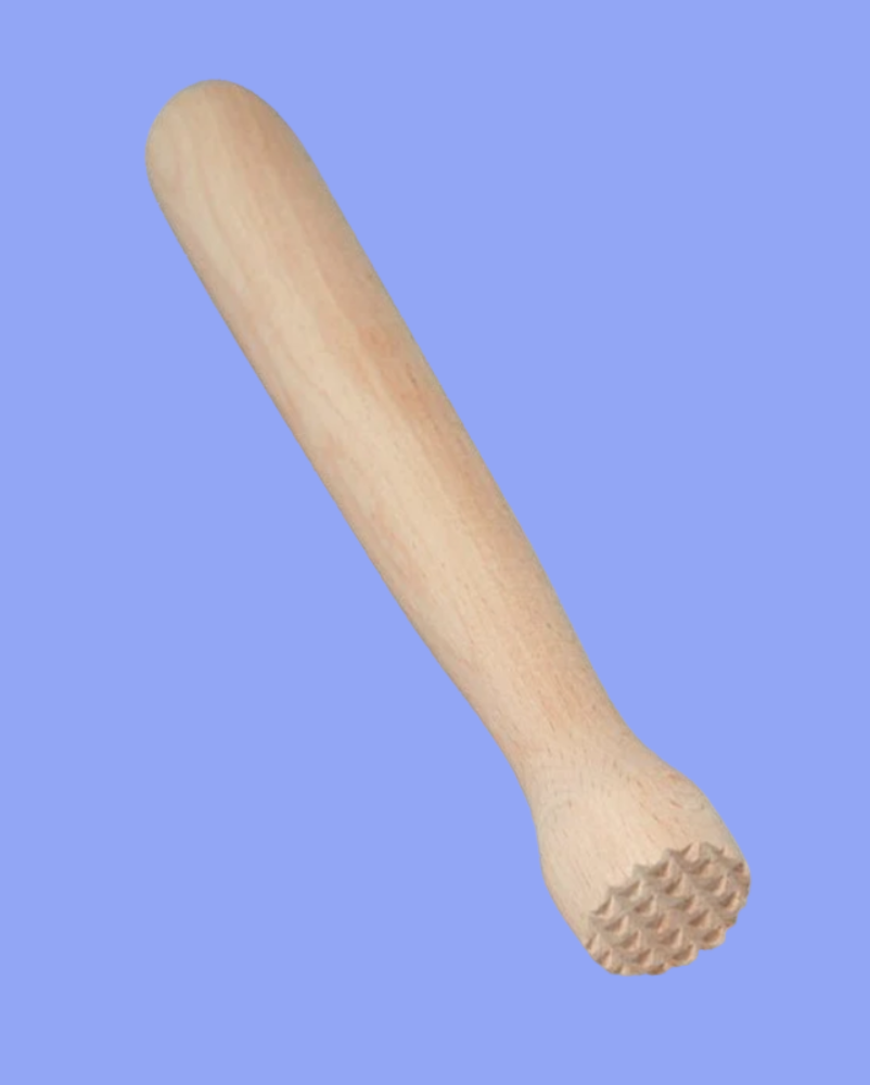 Wooden mallet with textured end on a blue background