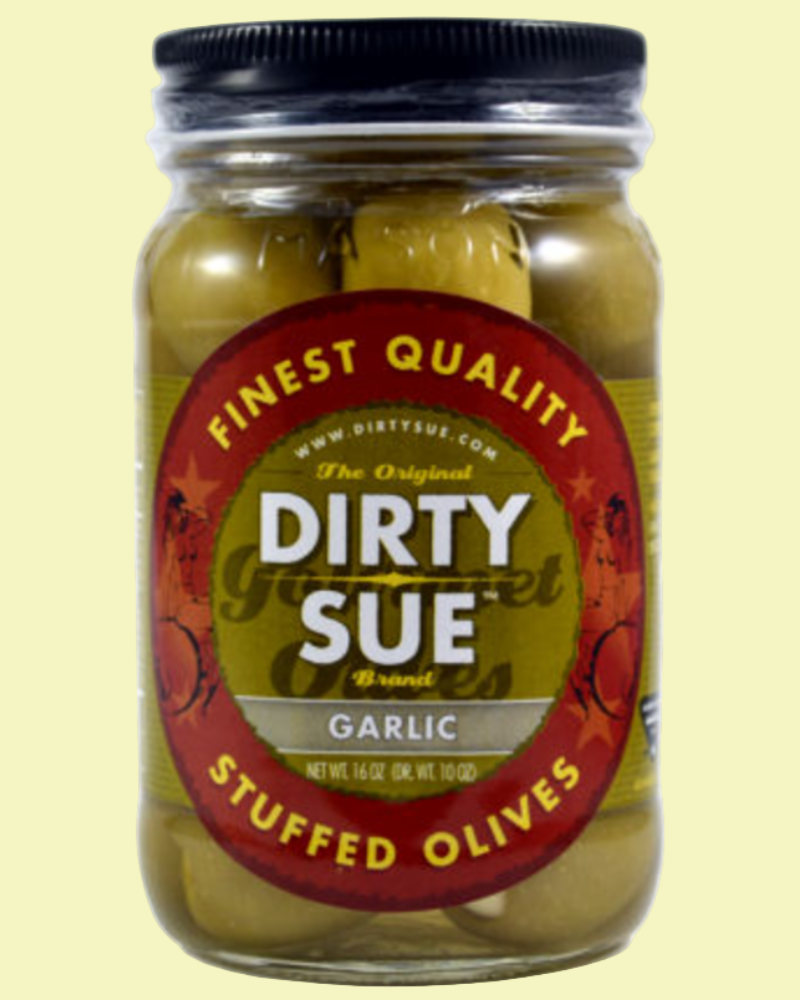 Jar of Dirty Sue garlic stuffed olives on a light yellow background