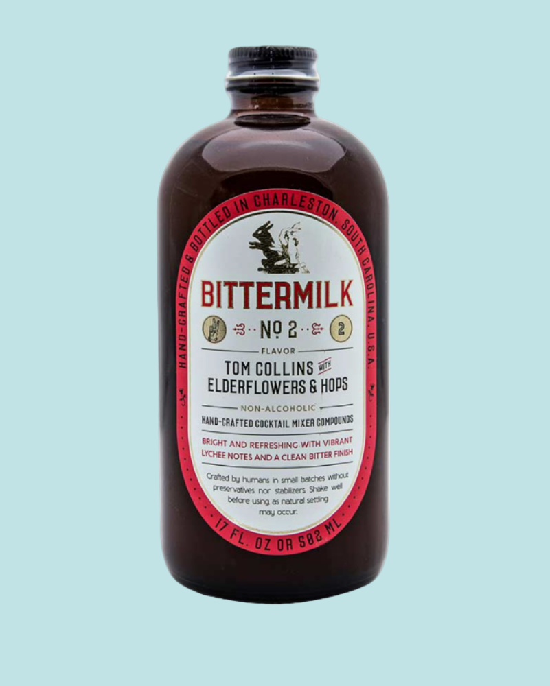 Bittermilk bottle with label on a light blue background