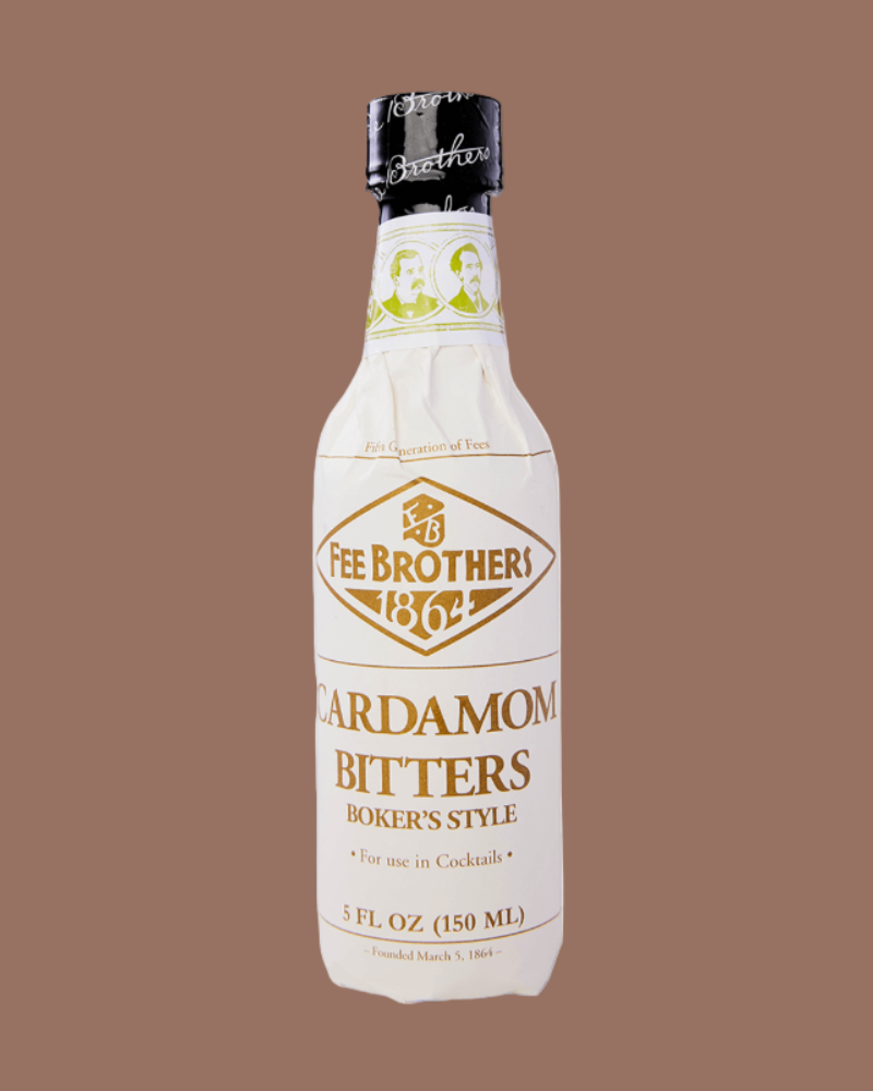 Bottle of Fee Brothers Cardamom Bitters on a brown background