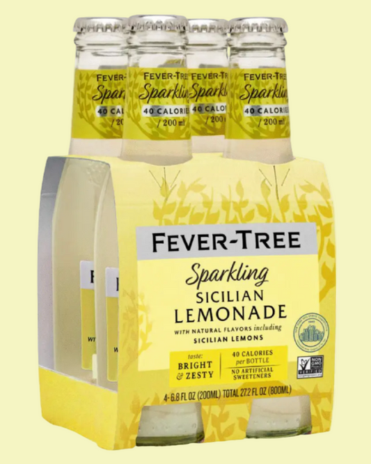 Pack of Fever-Tree Sicilian Lemonade bottles on a light yellow background