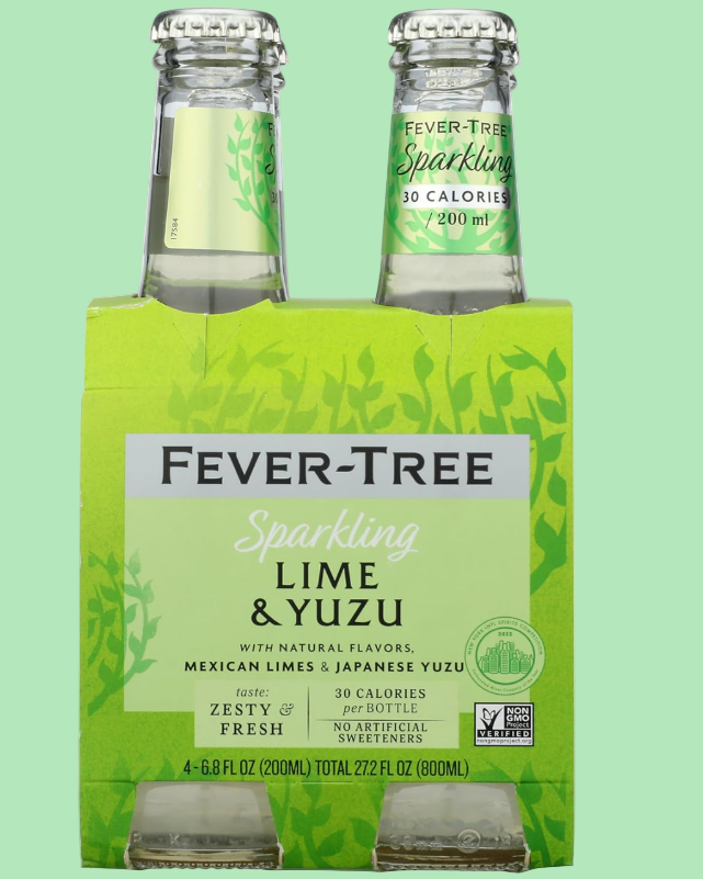 Pack of Fever-Tree Sparkling Lime & Yuzu bottles on a green background