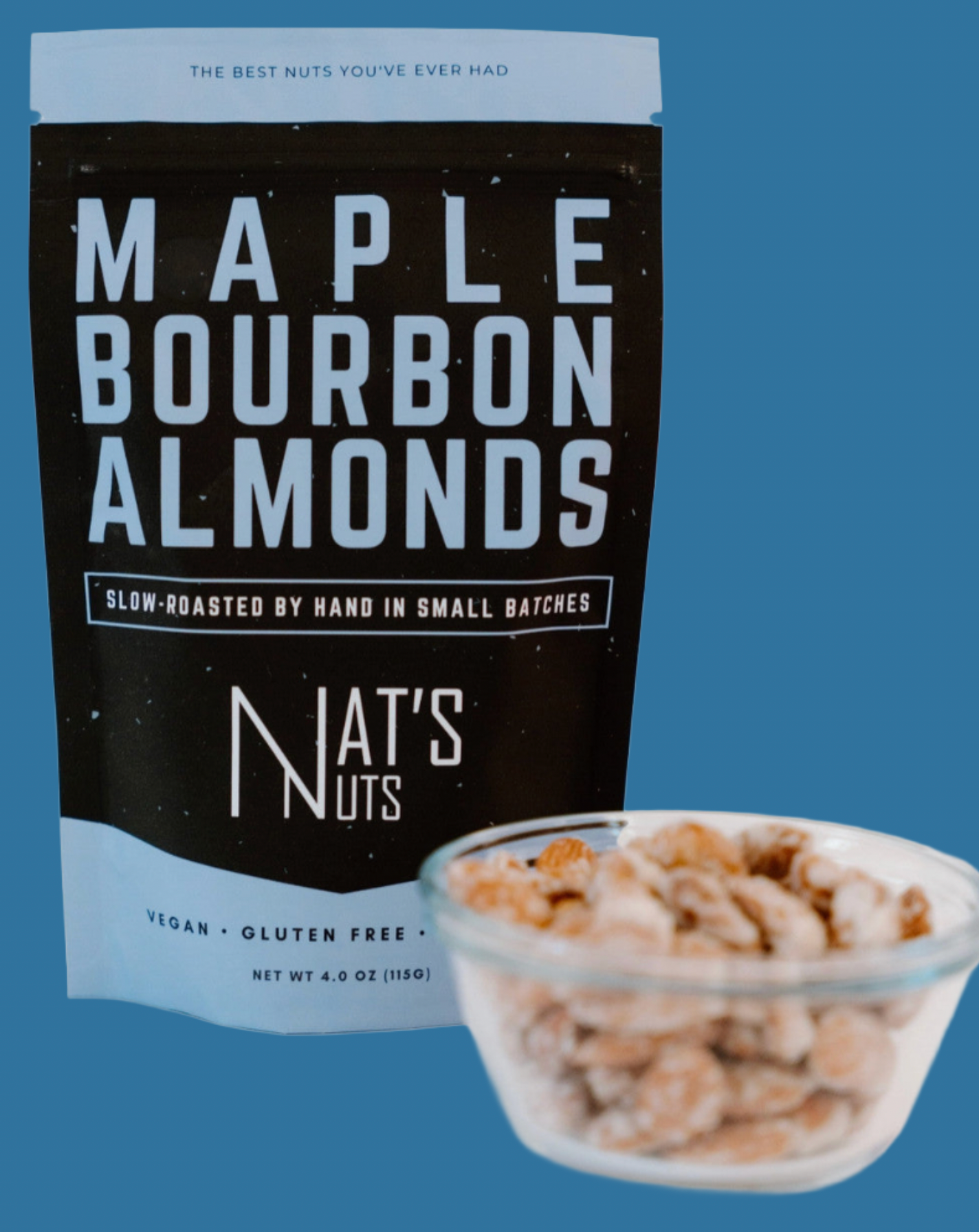 Bag of Maple Bourbon Almonds from Nat's Nuts with a bowl of almonds on a white background
