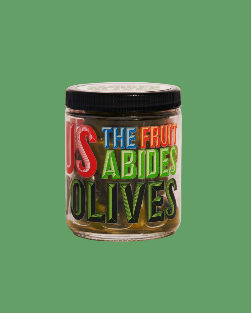 Jar of olives with colorful text on a green background