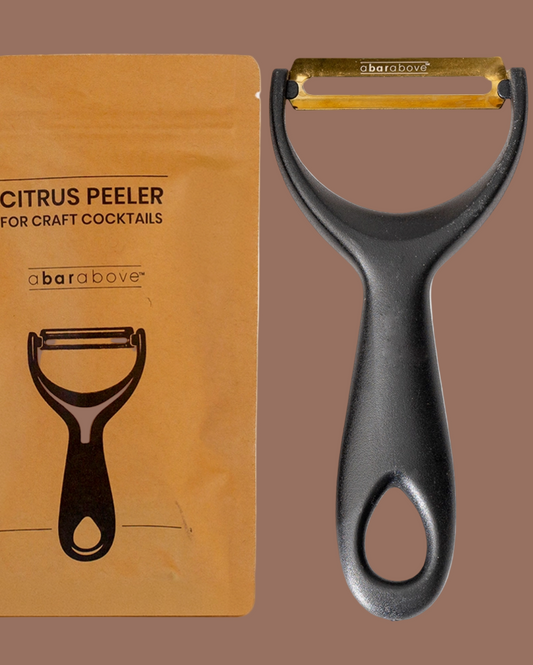Citrus peeler with packaging labeled 'a bar above' on a white background
